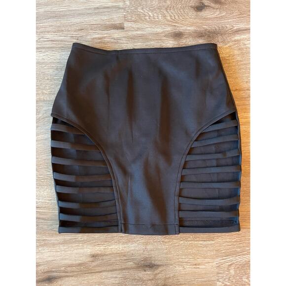 Rehab Dresses & Skirts - Rehab Black Skirt with Cut Outs Size Small